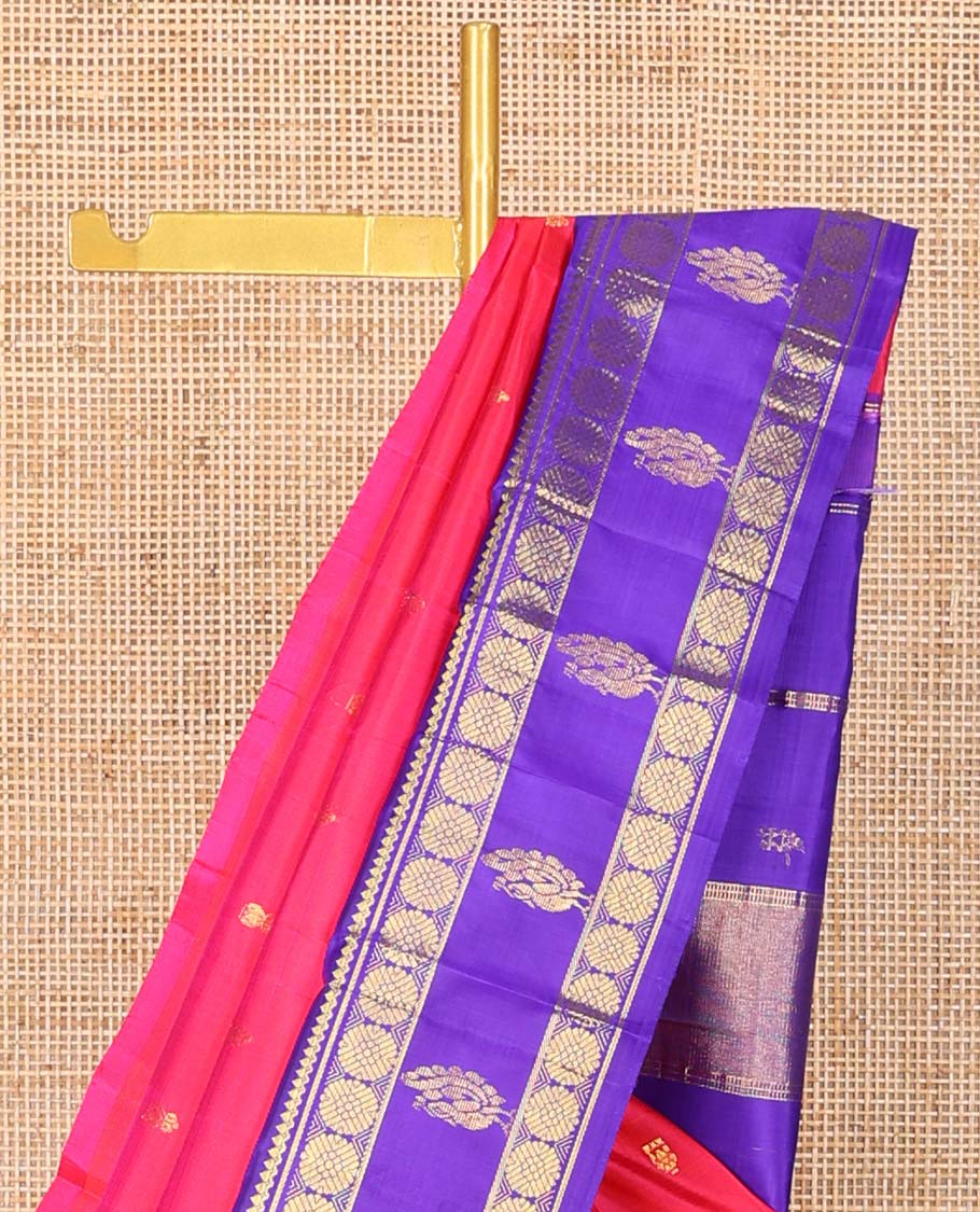 Red floral buttas kancheepuram silk saree with contrast rettai pettu border of thilkam mokku, poo chakram, banaras, mayil design & floral design pallu