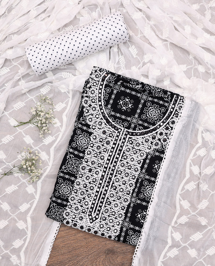 Black Material Chudidar Set, Elevated with Intricately Printed and Neck Embroidery Rayon Top, a Contrast Polka Dot Printed Bottom, and Paired with Embroidered Chiffon Dupatta