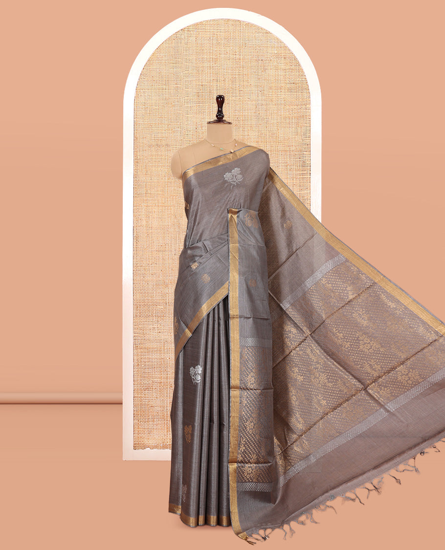 Grey Tussar Saree, Showcasing Floral Buttas, a Subtle Zari Border, Pallu of Polka Dot and Floral Designs, and a Matching Blouse