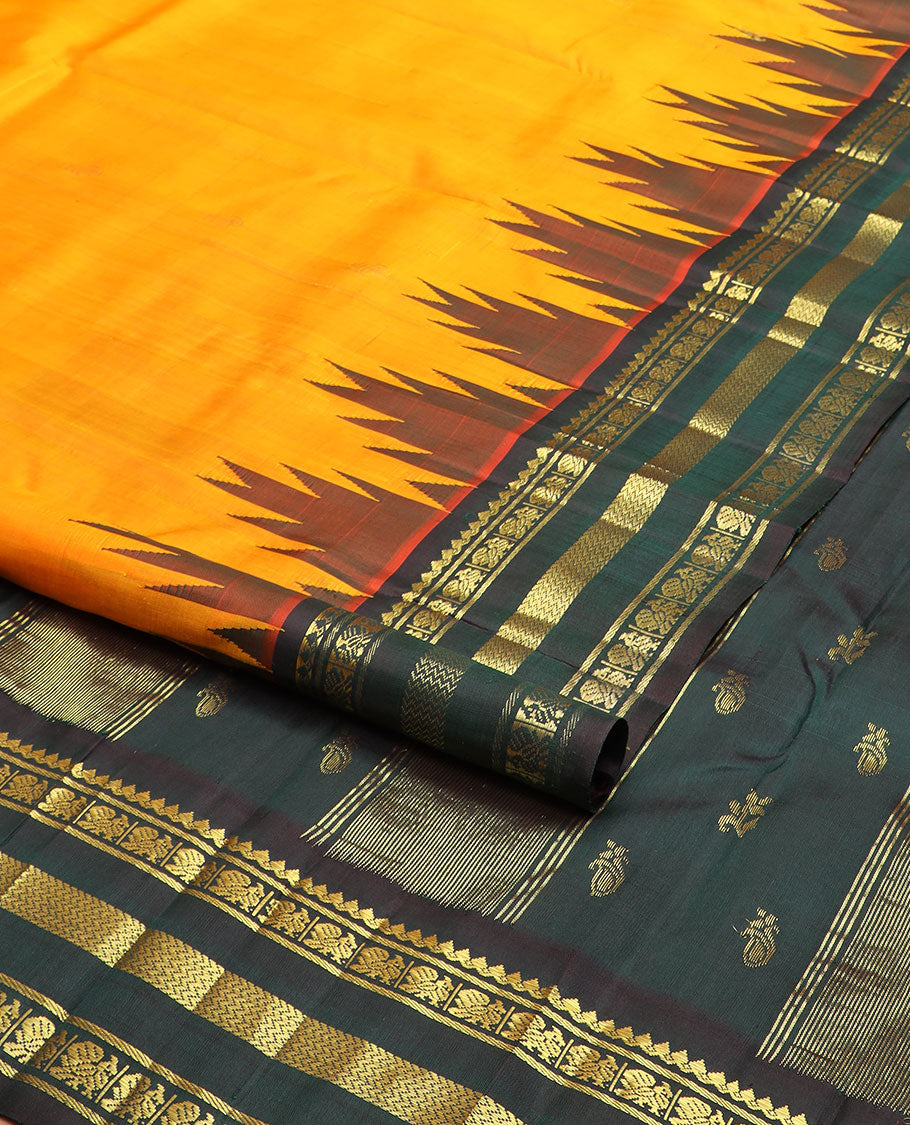 Orange zari buttas kanchipuram silksaree, contrast one-sided thazampoo rekku border of salngai,banaras,mayil & vanki & zari design pallu