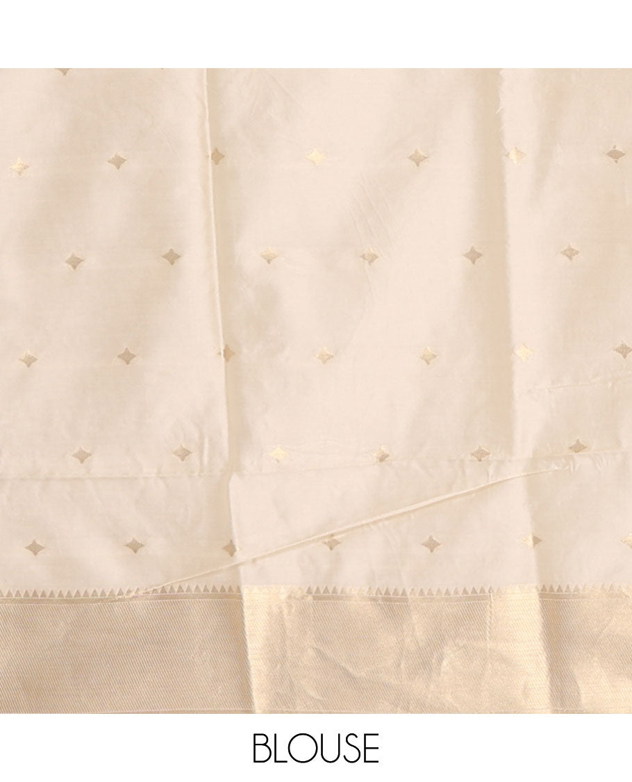 Cream zari thilakam buttas tissue silk saree, zari-woven border, pallu of pichwai lotus designs & zari design blouse