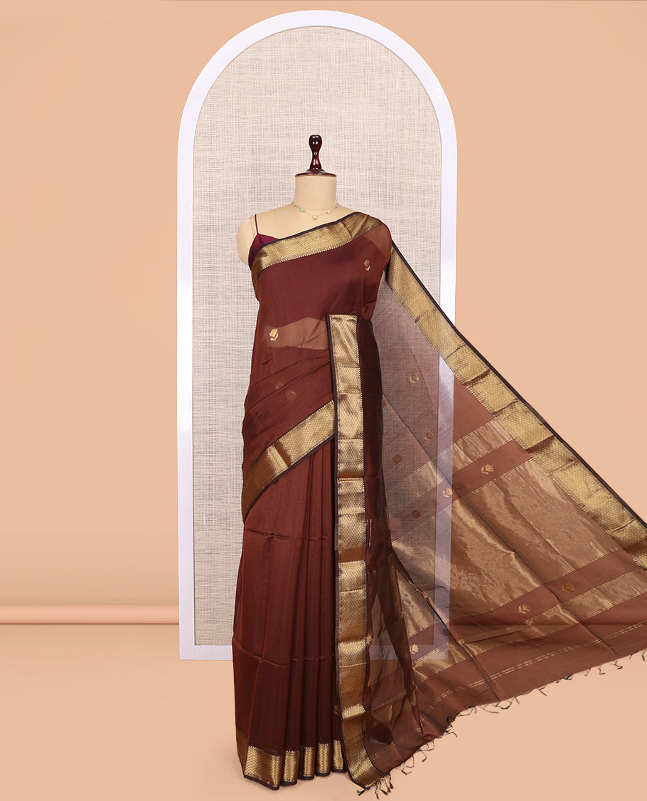 Brown Maheshwari Cotton Saree, Accentuated with Buttas, Highlighted by a Traditional Zari Border, Zari Gleamed Up Pallu, and a Matching Blouse