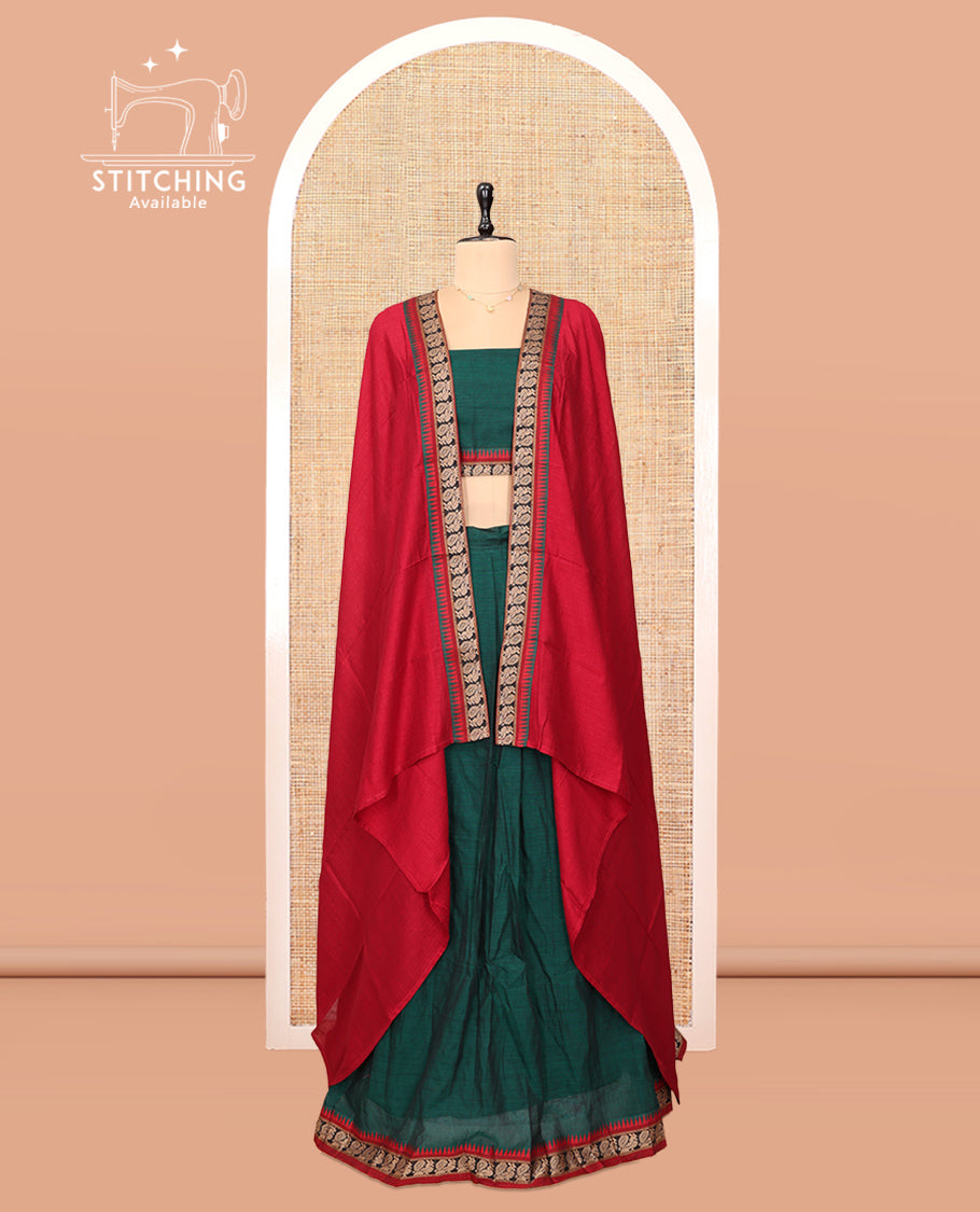 Green Cotton Half-Saree Features Plain Skirt, a Contrast Peacock Border, a Matching Blouse, and a Contrast Dhavani
