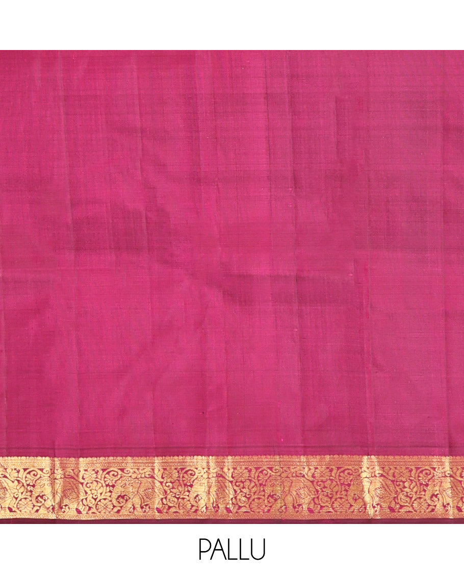 Orange Kanchipuram Silk Saree, Mesmerized with Mayil and Chakram Buttas All Over Its Body, Complemented by Contrast Border of Thilakam, Cross Kamalam, and Yaanai Designs, Pallu Steeped with Rettai Mayil Designs, and Paired with a Contrast Blouse