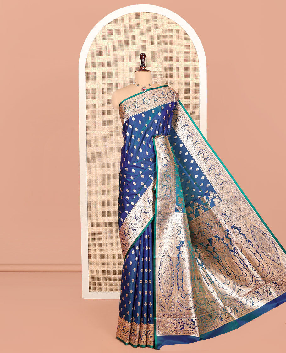 Blue Banarasi Nylon Saree, Majestically Detailed with Zari Buttas, Highlighted by a Floral Creeper Zari Border, Intricate Pallu, and a Matching Blouse