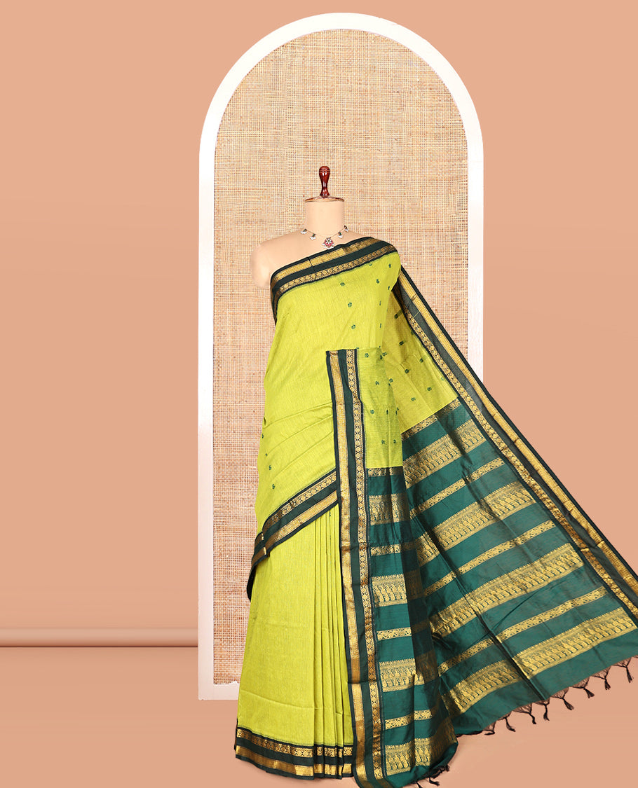 Leaf Green Kalyani Cotton Saree, Finely Crafted with Thread Buttas, a Contrast Traditional Rettai Pettu Zari Border, Grand Pallu, and a Contrast Blouse