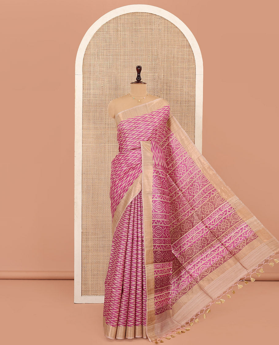 Pink Tussar Silk Saree Enthralled with Ikkat-Style Chevron Stripes Printed All Over Its Body, Complemented by Contrast Border, Pallu Printed with Ikkat Designs, and Paired with a Contrast Blouse