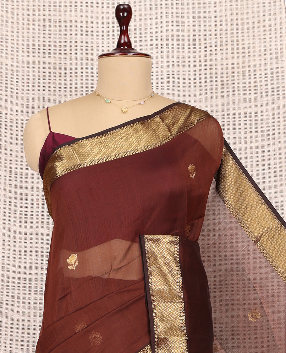 Brown Maheshwari Cotton Saree, Accentuated with Buttas, Highlighted by a Traditional Zari Border, Zari Gleamed Up Pallu, and a Matching Blouse