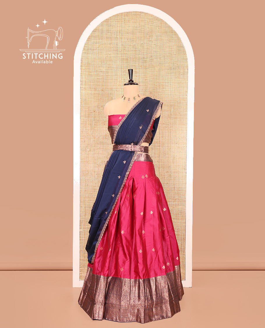 Pink and Navy Blue Semi-Banarasi Half-Saree, Decorated with Zari Buttas on Its Skirt, Complemented by a Contrast Traditional Zari Designs Woven Border, Paired with a Matching Blouse, and a Contrast Satin Georgette Embroidered Scallop Dhavani