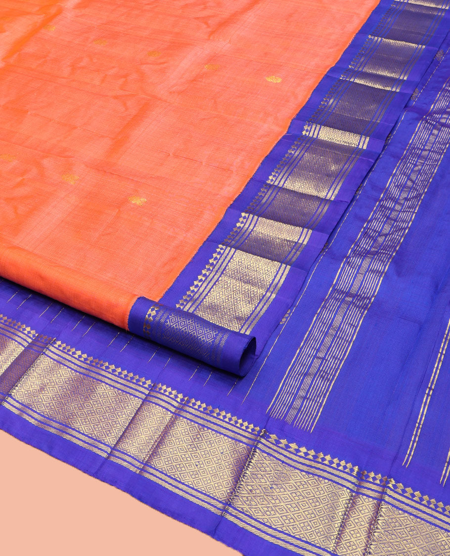 Orange Kanchipuram Silk Saree, Decorated with Zari Buttas on Its Body, Complemented by Contrast One-Sided Korvai Border of Panner Sombu, Banaras, and Jaal Designs, Pallu Features Zari Designs, and Comes Without a Blouse