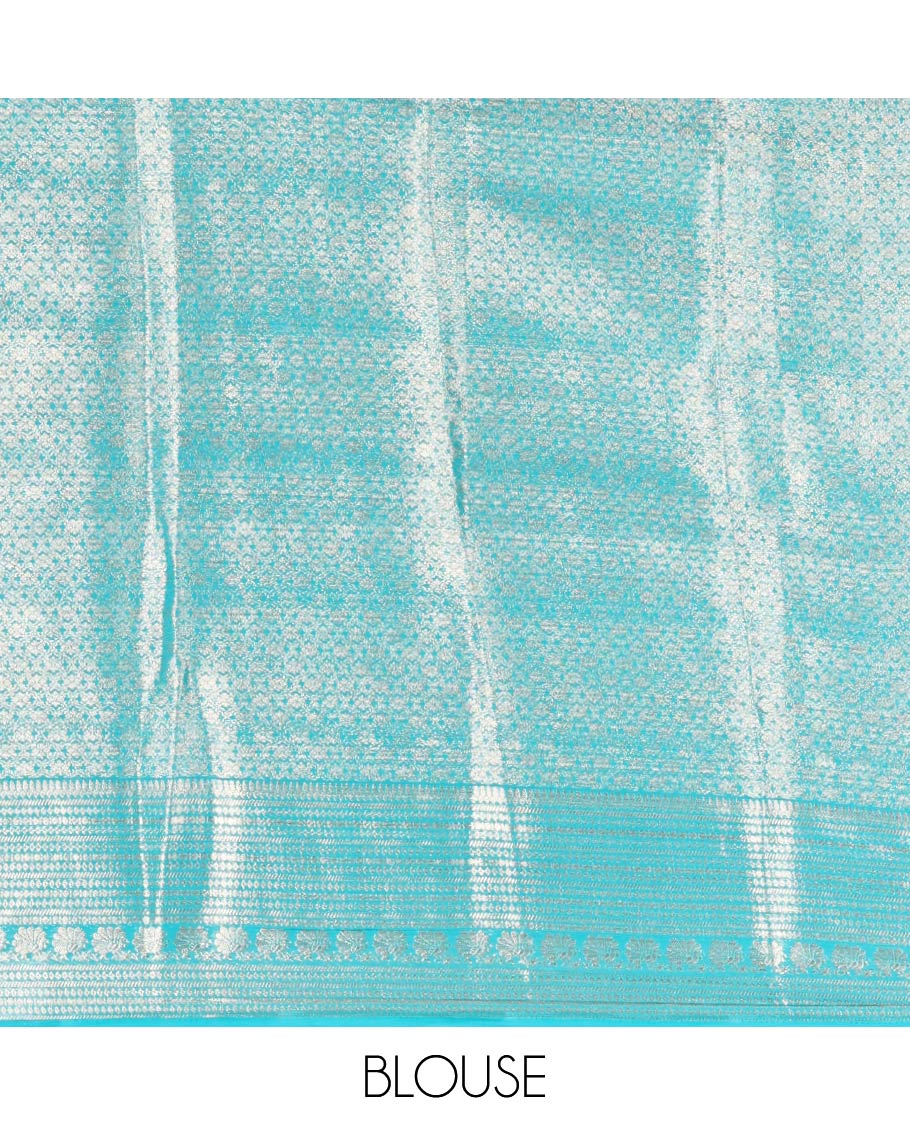 Rama Georgette Saree, Embellished with Peacock Buttas and Zari Checks All Over Its Body, Highlighted by a Traditional Zari Border, Grandly Zari-Decked Pallu, and Paired with a Matching Brocade Blouse