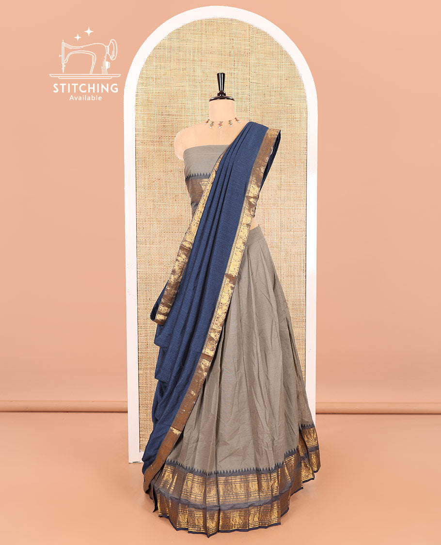 Steel Grey-Navy Blue Chettinad Cotton Half-Saree Featuring a Plain Skirt, Highlighted with a Contrast Peacock-Elephant Motifs Woven Rettai Pettu Zari Border, a Subtly Woven Matching Blouse, and a Vichitra Silk Contrast Traditional Zari-Bordered Dhavani