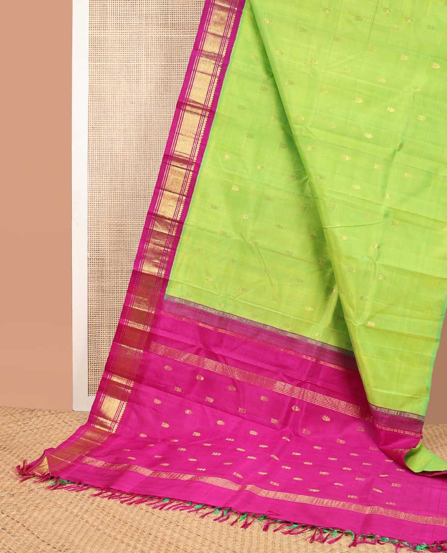 Green buttas kanceepuram silk saree with contrast korvai border of thilakam mokku, banaras design & zari design pallu