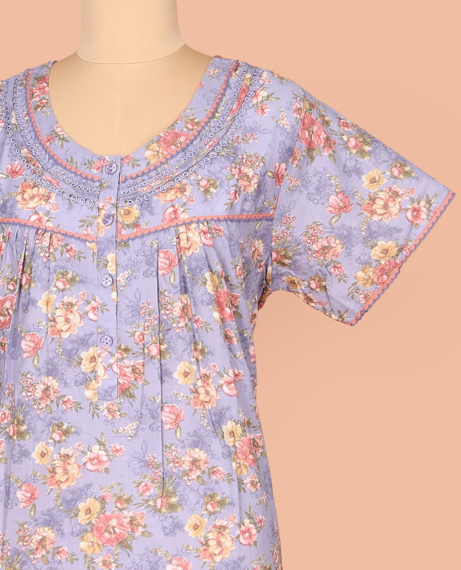 Lavender Cotton Nighty Decked Up with Floral Print, Featuring Lace Work, Round Front Neck, and Half Sleeves