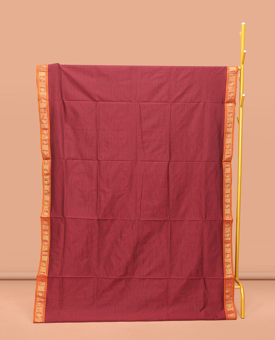 Maroon Poly Cotton Saree, Subtly Sparkled with Stripes on Its Body, Complemented by Contrast Traditional Zari Border of Paisleys, Striped Pallu, and Paired with a Contrast Blouse
