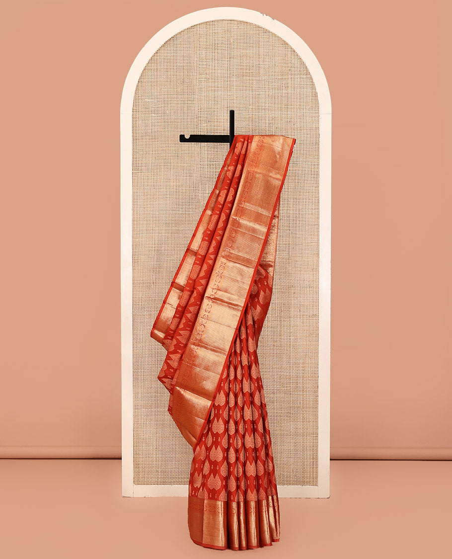 Rust Kanchipuram Wedding Silk Saree, Steeped with Zari Buttas All Over Its Body, Highlighted by Zari Border of Chakram and Vanki Designs, Grand Jaal Pallu and Paired with a Matching Blouse