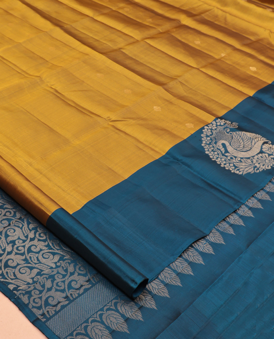 Mustard Mayuri Lite Silk Mix Saree, Graced with Zari Buttas, Complemented By Contrast Peacock-Paisley Butta Border, a Floral Vine Pallu, and a Contrast Blouse