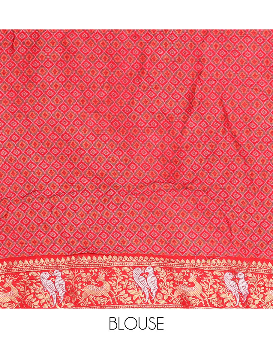 Brown bandhani dots and zari buttas bandhani silk saree, contrast flora-fauna motifs woven border, and patola elephant enclosed ogee patterned pallu