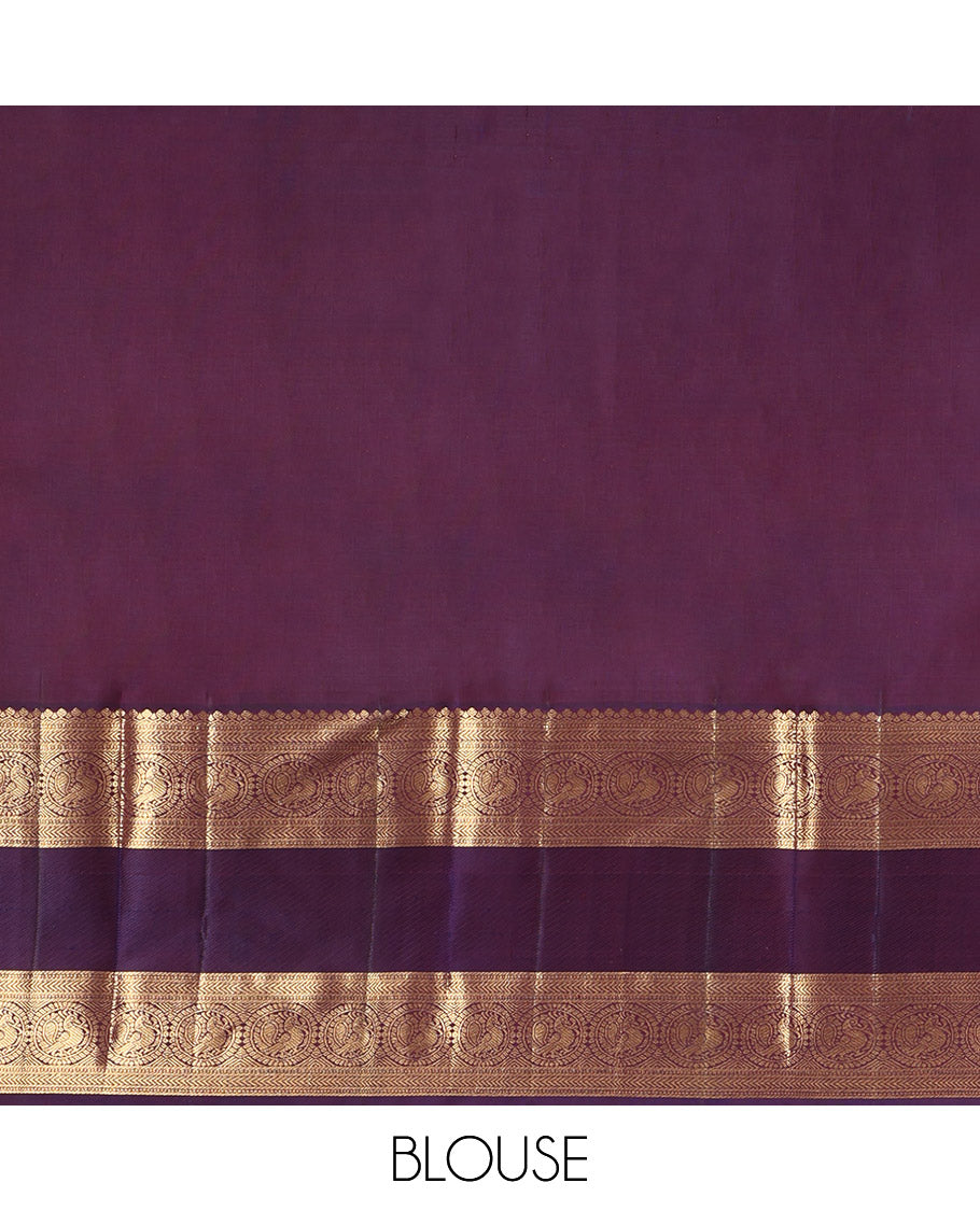 Mustard Kanchipuram Silk Saree, Embellished with Round Buttas All Over Its Body, Complemented by a Contrast Rettai Pettu Border of Thilakam Mokku, Muthu, Kathir, and Round Mayil Designs, Grand Jaal Pallu, and Paired with a Contrast Blouse