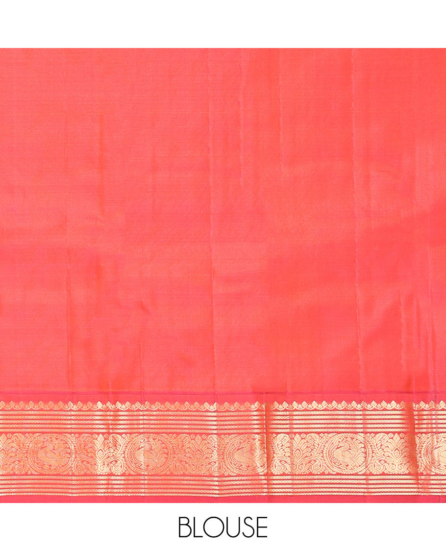 Green Vasundhara Silk Saree, Elevated with Mayil Zari Buttas All Over Its Body, Complemented by a Contrast Border of Thilakam Mokku, Kathir, and Round Mayil Designs, Grand Jaal Pallu, and Paired with a Contrast Blouse