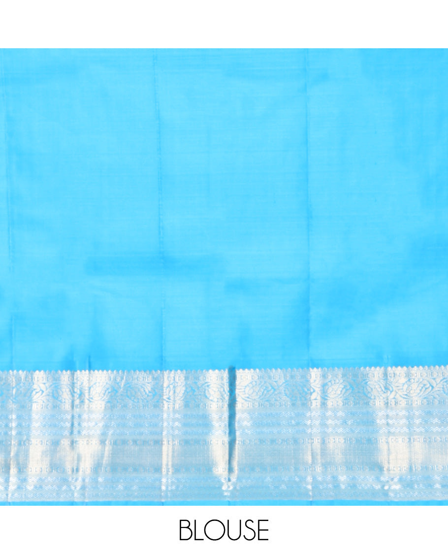 Blue Vasundhara Silk Saree, Decorated with Zari Buttas, Contrast Rettai Pettu Border of Thilakam Mokku, Kodi Visiry, Neli, and Mayil Kann Designs, Grand Pallu, and Contrast Blouse
