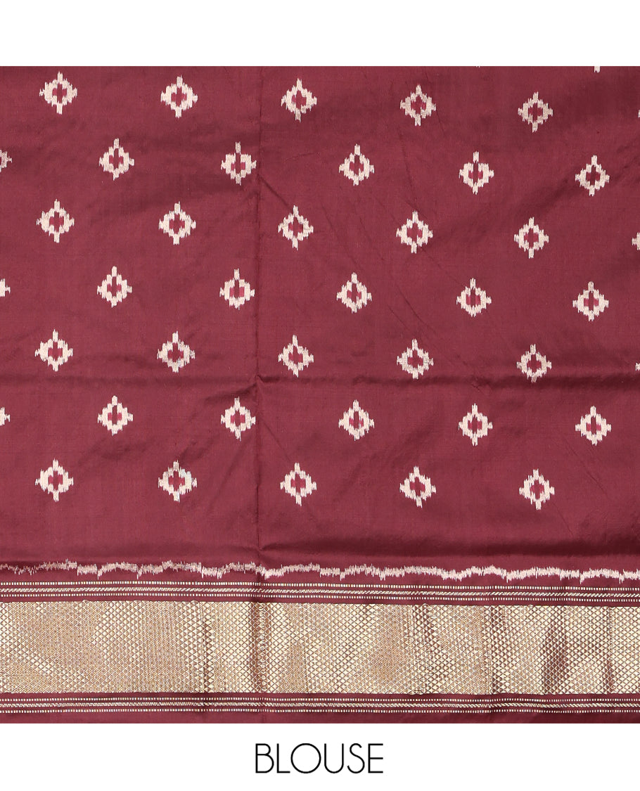 Brown Ikkat Silk Saree, Elevated with Ikkat Checks All Over Its Body, Subtle Border of Jaal Designs, Pallu of Geometric Designs, and Paired with a Matching Blouse