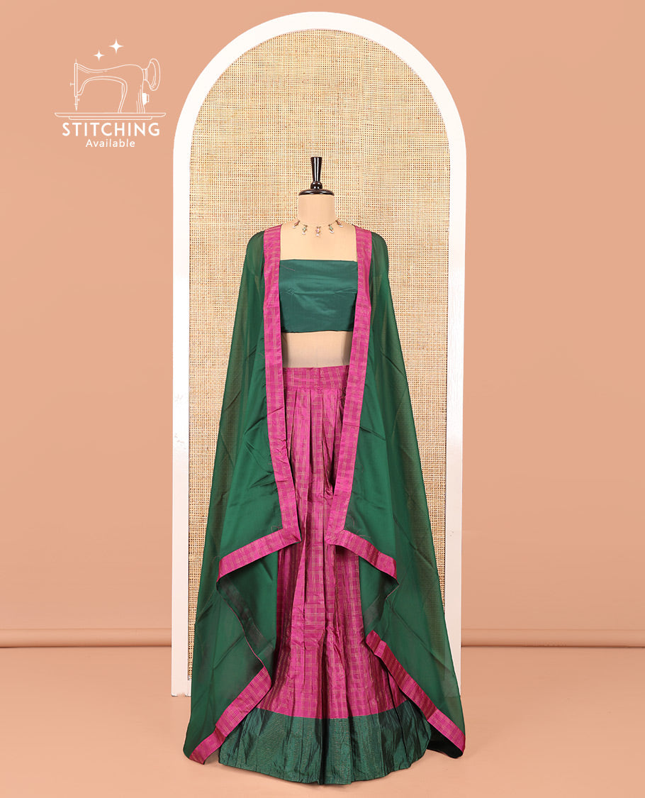 Purple and Green Checked Taffeta Silk Half-Saree, Complemented by Contrast Sparsely Striped Border, Paired with a Contrast Blouse, and Comes with Subtle-Bordered Satin Georgette Dhavani