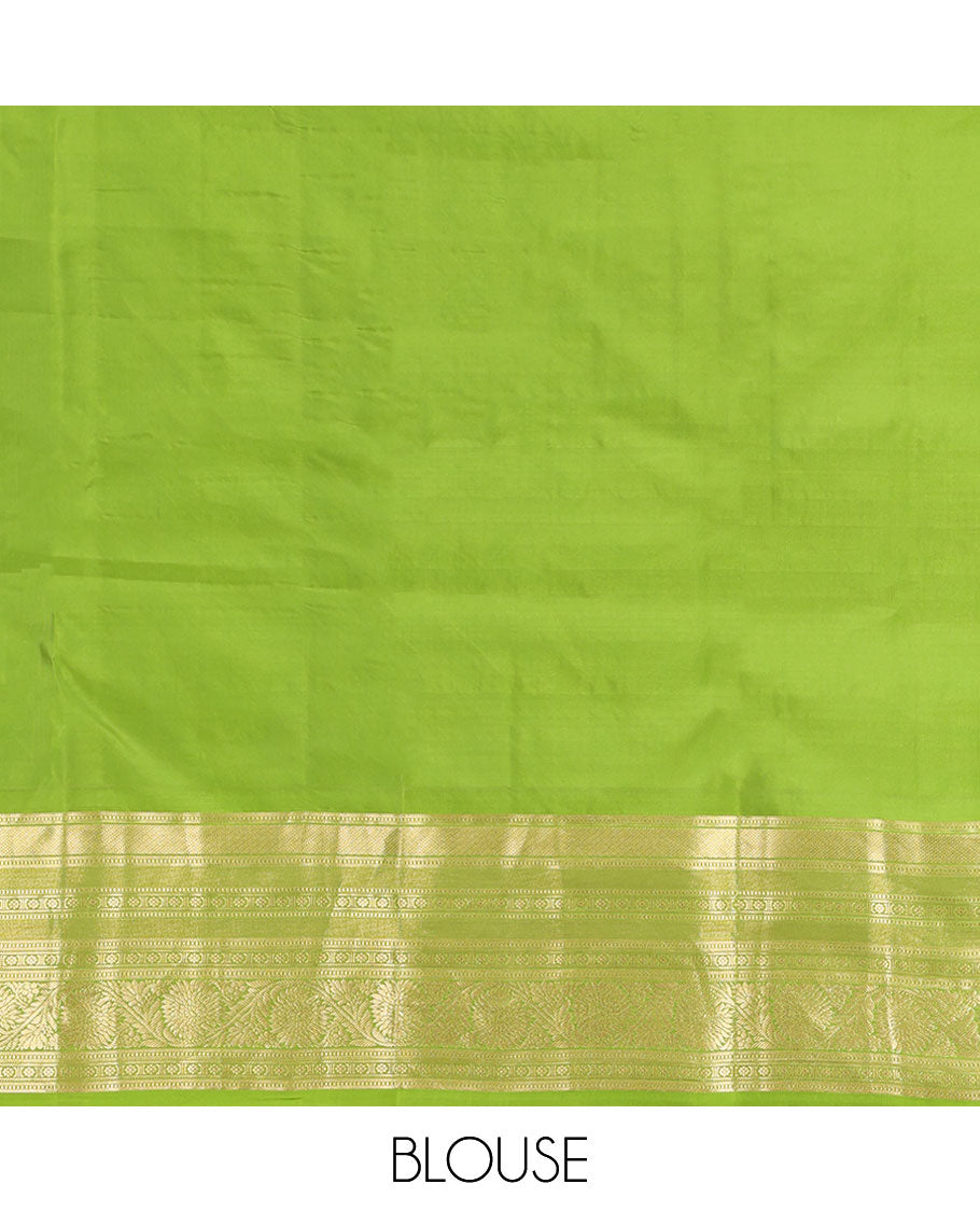 Green Vasundhara Lite Silk Mix Saree, Subtly Sparkled with Zari Buttas and Stripes, a Zari Border of Muthu, Kamalam, and Kodi Visiry, Jaal Pallu, and a Matching Blouse
