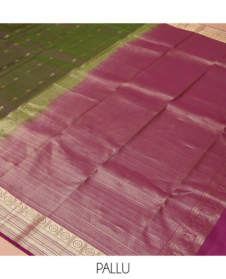 Green Vasundhara Silk Saree, Crafted with Zari Buttas All Over Its Body, Complemented by a Contrast Border of Rekku, Chakram, Neli, and Banaras Designs, Intricately Designed Pallu, and Paired with a Contrast Blouse