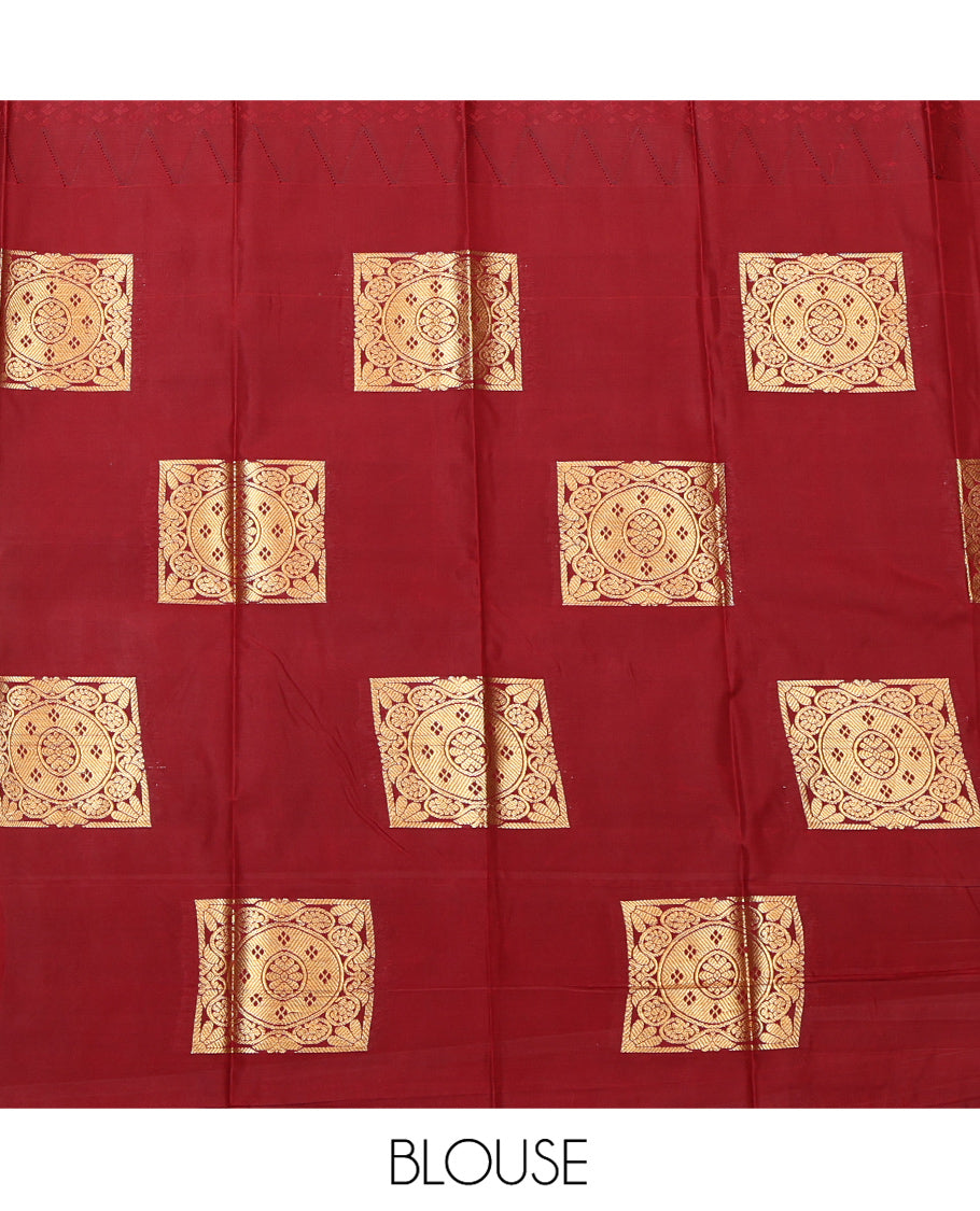 Borderless Red and Green Budget Silk Saree Features Embossed and Zari Buttas, Complemented by a Intricate Pallu, and Contrast Blouse