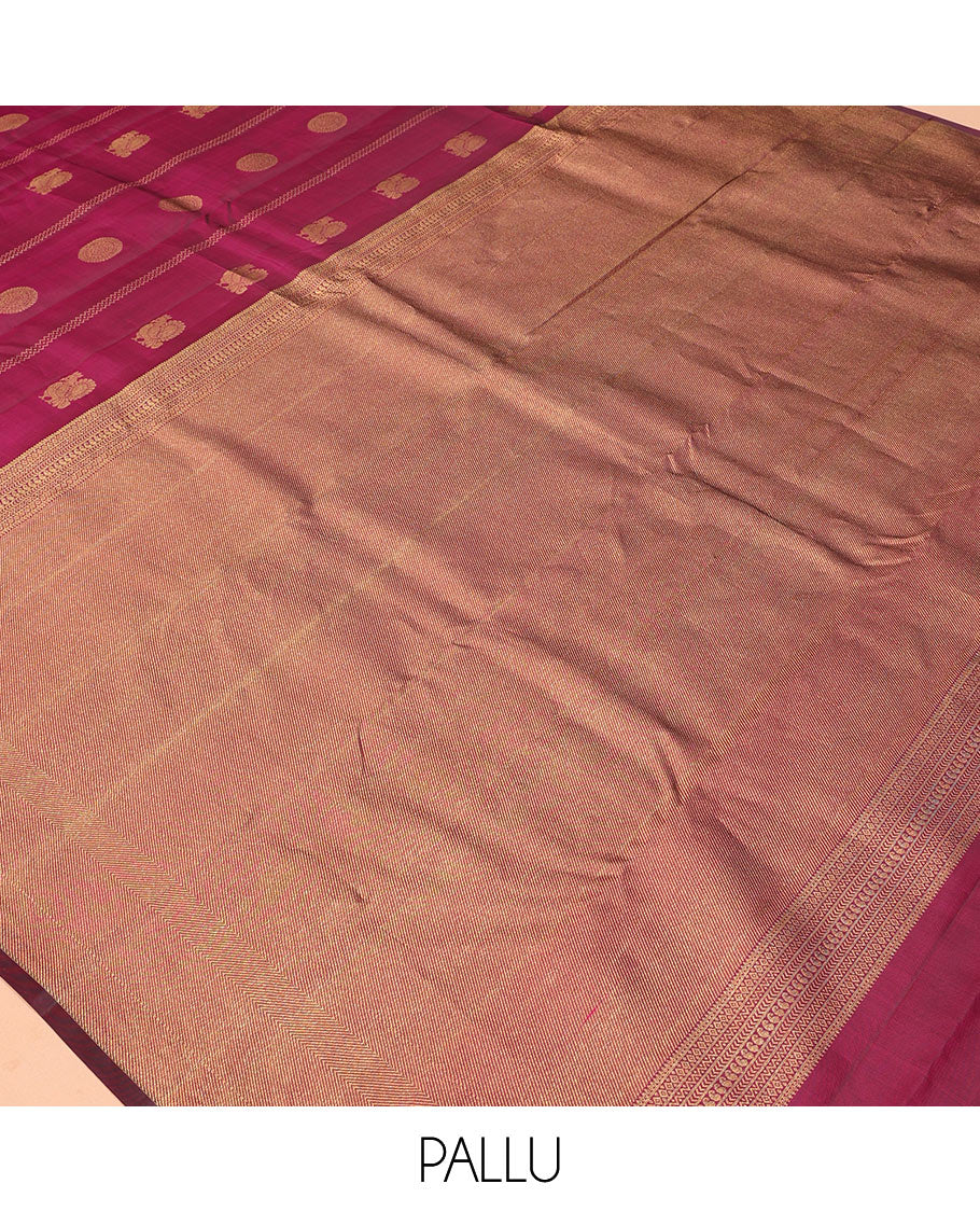 Borderless Purple Vasundhara Silk Saree, Artfully Detailed with Mayil and Chakram Buttas, Grandly Woven Pallu, and a Matching Blouse