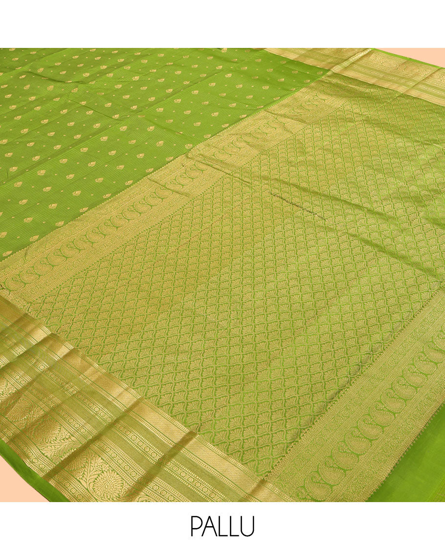 Green Vasundhara Lite Silk Mix Saree, Subtly Sparkled with Zari Buttas and Stripes, a Zari Border of Muthu, Kamalam, and Kodi Visiry, Jaal Pallu, and a Matching Blouse