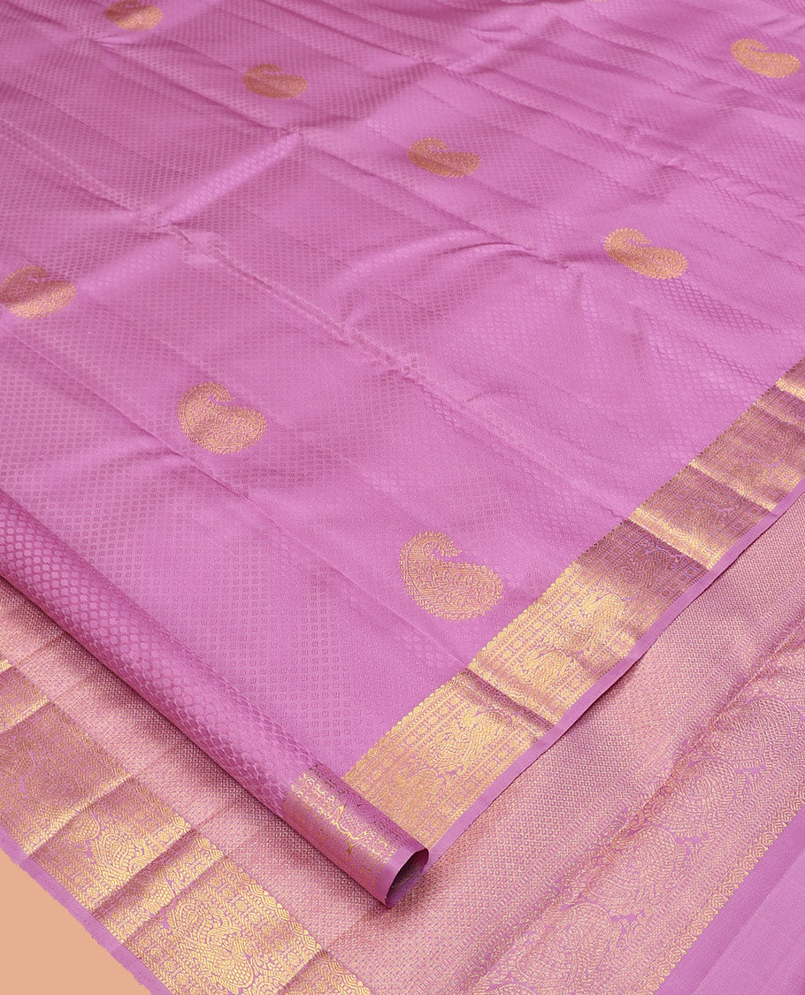 Light Purple Parampara Silk Saree, Embellished with Embossed and Zari Buttas, a Zari Border of Thilakam, Muthu, Banaras, Poun, and Mayil Designs, Mayil Kann Pallu, and a Matching Blouse