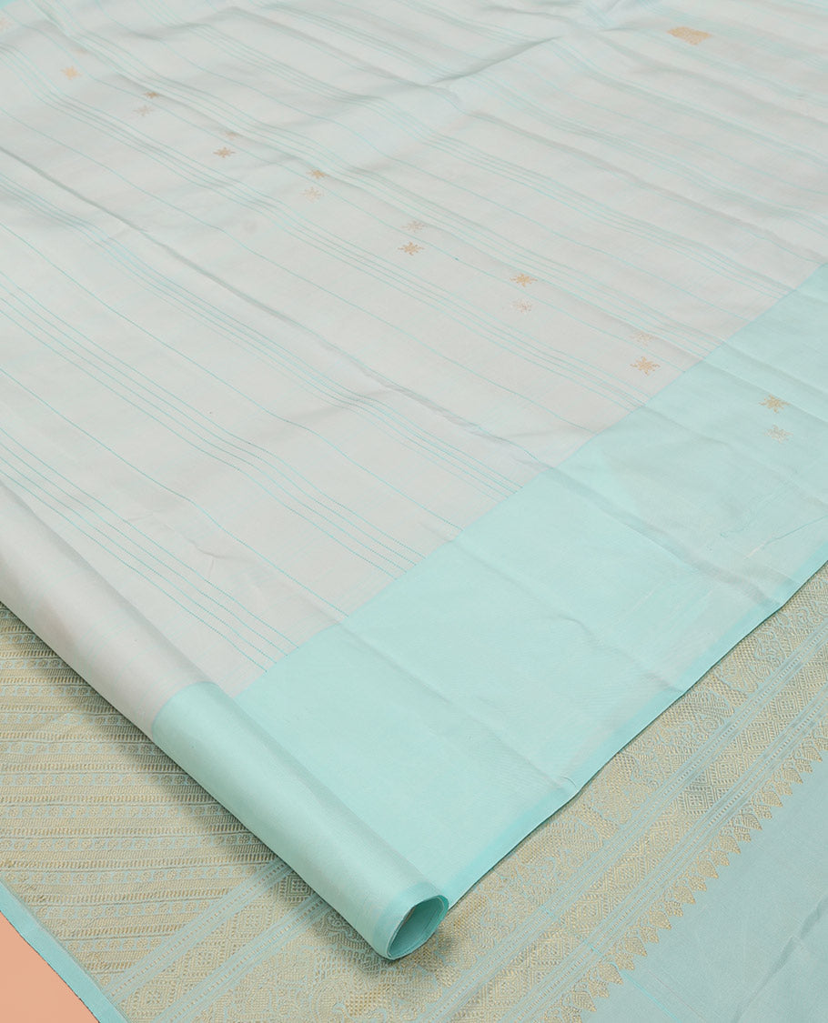 Pale Blue Kanchipuram Silk Saree, Subtly Sparkled with Buttas, and Stripes, a Contrast Border, Zari Design Pallu, and a Matching Blouse