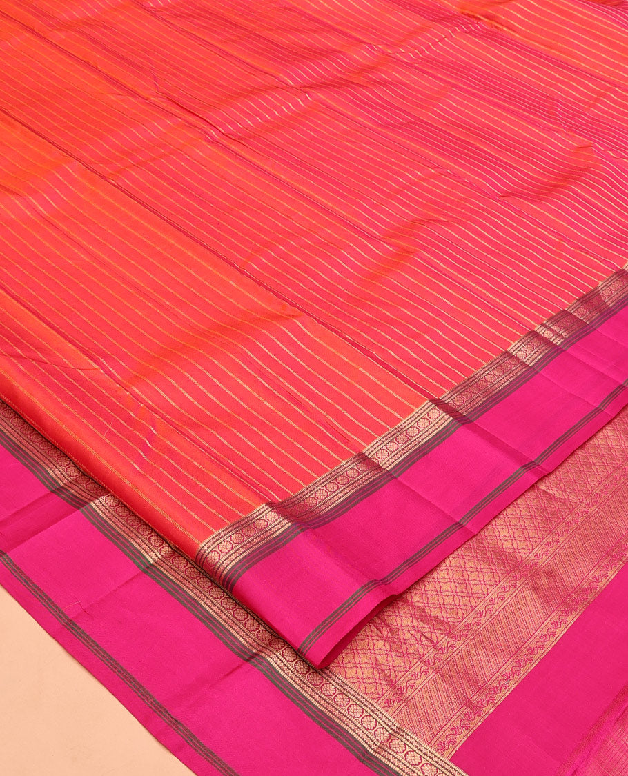 Orange Zari Striped Vasundhara Silk Saree, Contrast Kal Eragina Border of Neli, Muthu, Cross Kamalam Designs, Grand Pallu, and a Contrast Blouse