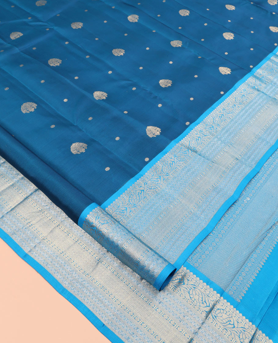Blue Vasundhara Silk Saree, Decorated with Zari Buttas, Contrast Rettai Pettu Border of Thilakam Mokku, Kodi Visiry, Neli, and Mayil Kann Designs, Grand Pallu, and Contrast Blouse