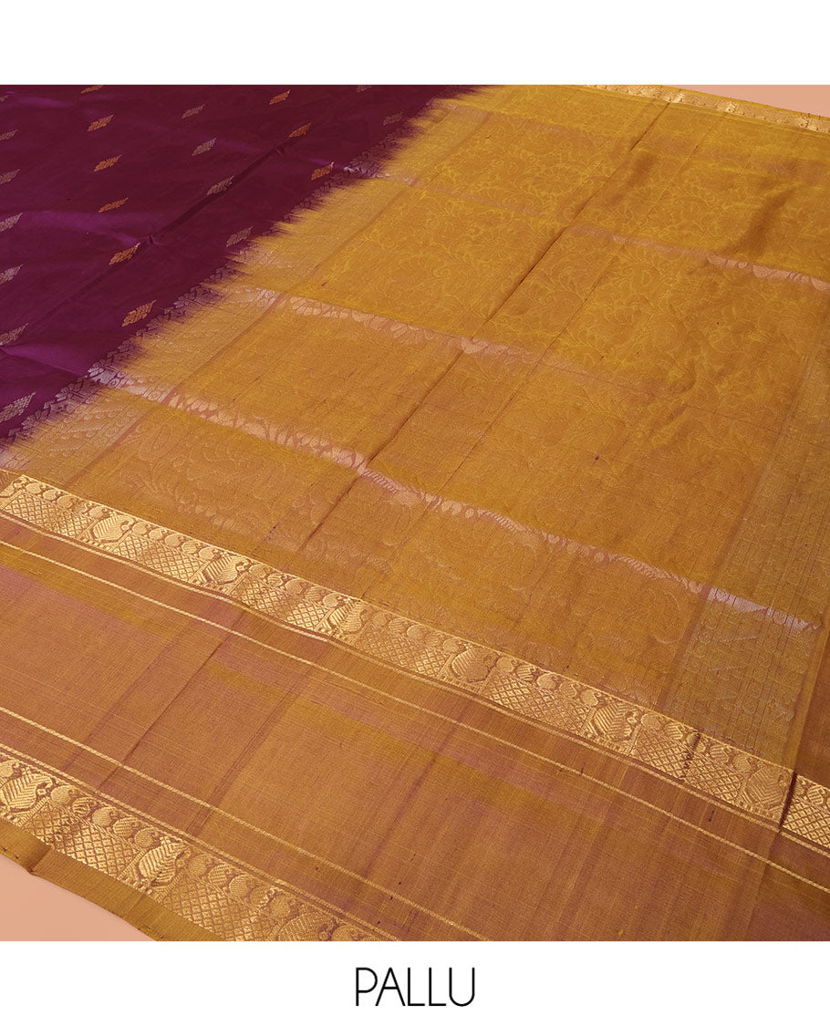 Purple Uppada Silk Saree Embellished with Zari Buttas, Complemented by a Contrast Traditional Zari Border of Zari Designs, Contrast Pallu of Floral and Paisley Designs, and Paired with a Contrast Blouse