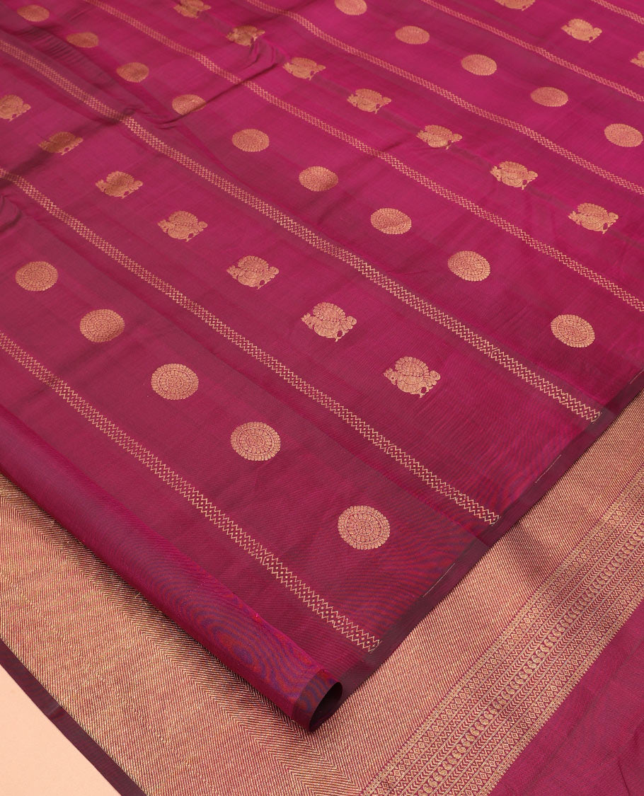 Borderless Purple Vasundhara Silk Saree, Artfully Detailed with Mayil and Chakram Buttas, Grandly Woven Pallu, and a Matching Blouse
