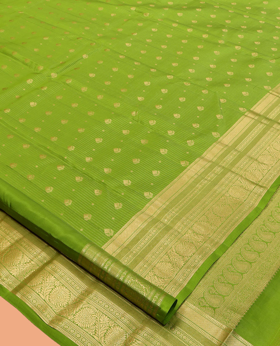 Green Vasundhara Lite Silk Mix Saree, Subtly Sparkled with Zari Buttas and Stripes, a Zari Border of Muthu, Kamalam, and Kodi Visiry, Jaal Pallu, and a Matching Blouse