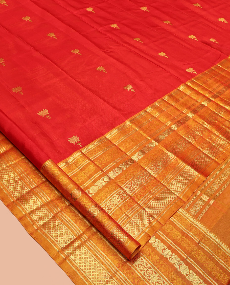 Red Venkatagiri Silk Saree, Mesmerized with Pichwai Lotus Buttas All Over Its Body, Complemented by a Contrast Traditional Zari Design Border, Pallu of Jaal Designs, and Paired with a Contrast Blouse
