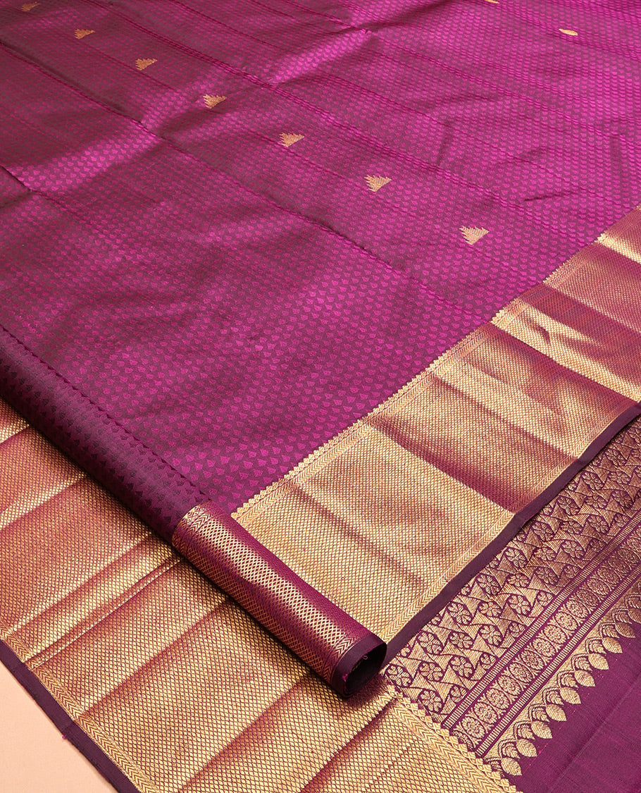 Purple Embossed Parambara Silk Saree, Accentuated with Thazampoo Rekku Buttas, a Zari Border of Thilakam Mokku, Kathir, and Kuyil Kann Designs, Pallu of Floral Design, and Matching Blouse