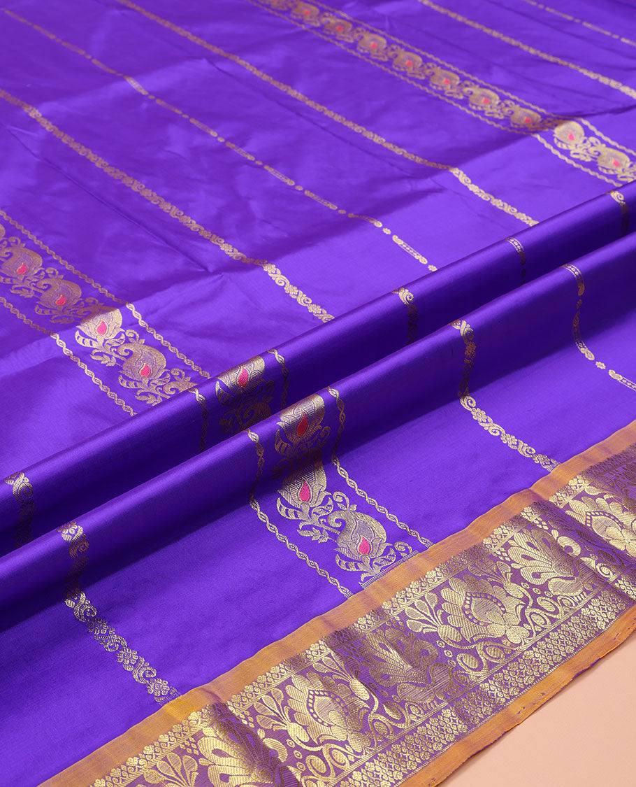 Blue Pure Silk Half-Saree, Decorated with Zari Designs on Its Body, Complemented by a Contrast Floral Design Border, Complemented by a Contrast Blouse, and Paired with a Contrast Dhavani of Annam Chakram Designs