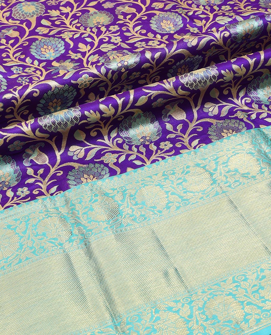 Violet floral jacquard silk half saree with contrast border of thilakam mokku, kodi visiry, banaras design, zari design blouse & floral design dhavani