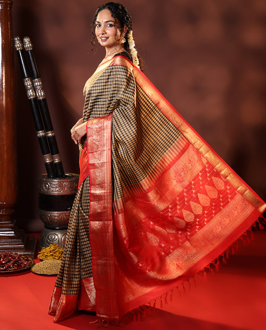 Black Vasundhara Silk Saree Embellished with Checks All Over Its Body, Complemented by Contrast Border of Rekku, Neli, Rudraksham, Kathir, and Mayil Designs, a Grand Pallu of Intricate Designs, and Paired with a Contrast Blouse