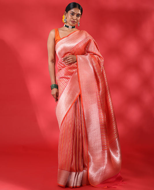 Orange geometric patterns striped organza saree, contrast traditional zari design border & zari-rich intricate pallu