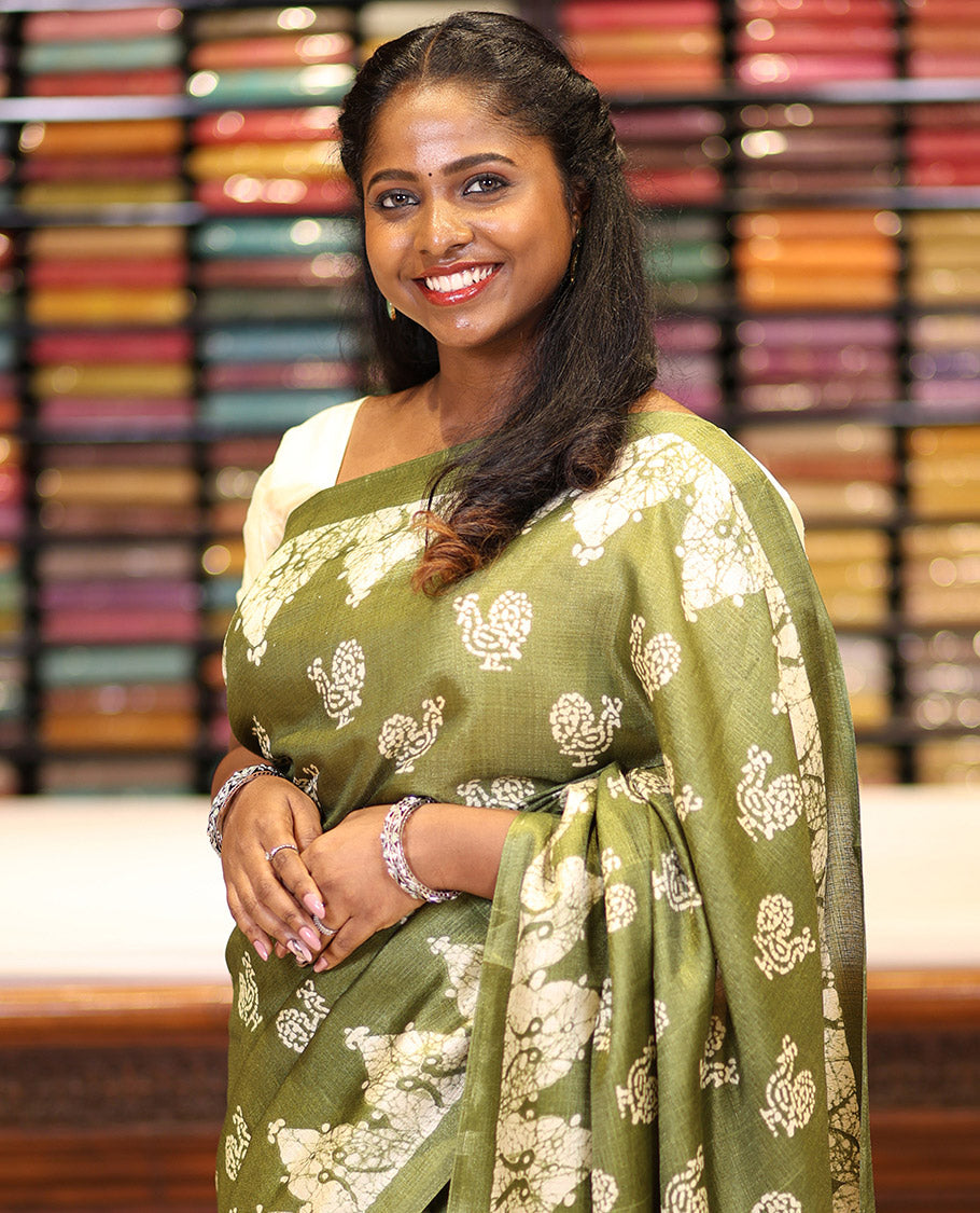Green all-over pathik peacock print semi Khadi silk saree with pathil temple border & printed rich pallu along with printed blouse