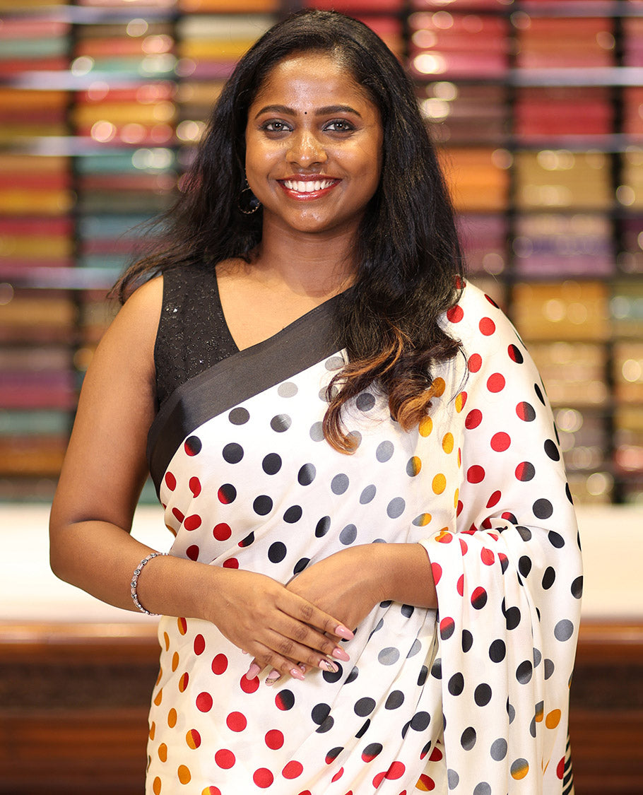 Cream polka dot printed design modal silk saree with contrast piping border & printed pallu along with printed blouse