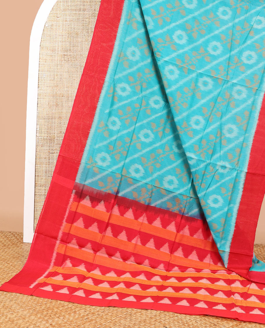 Light blue floral design ikkat cotton saree with contrast border & geometric design pallu