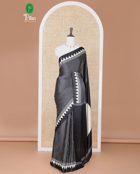 Black with white vertical lining printed design semi modal crepe saree with temple border & circle butta pallu along with printed blouse