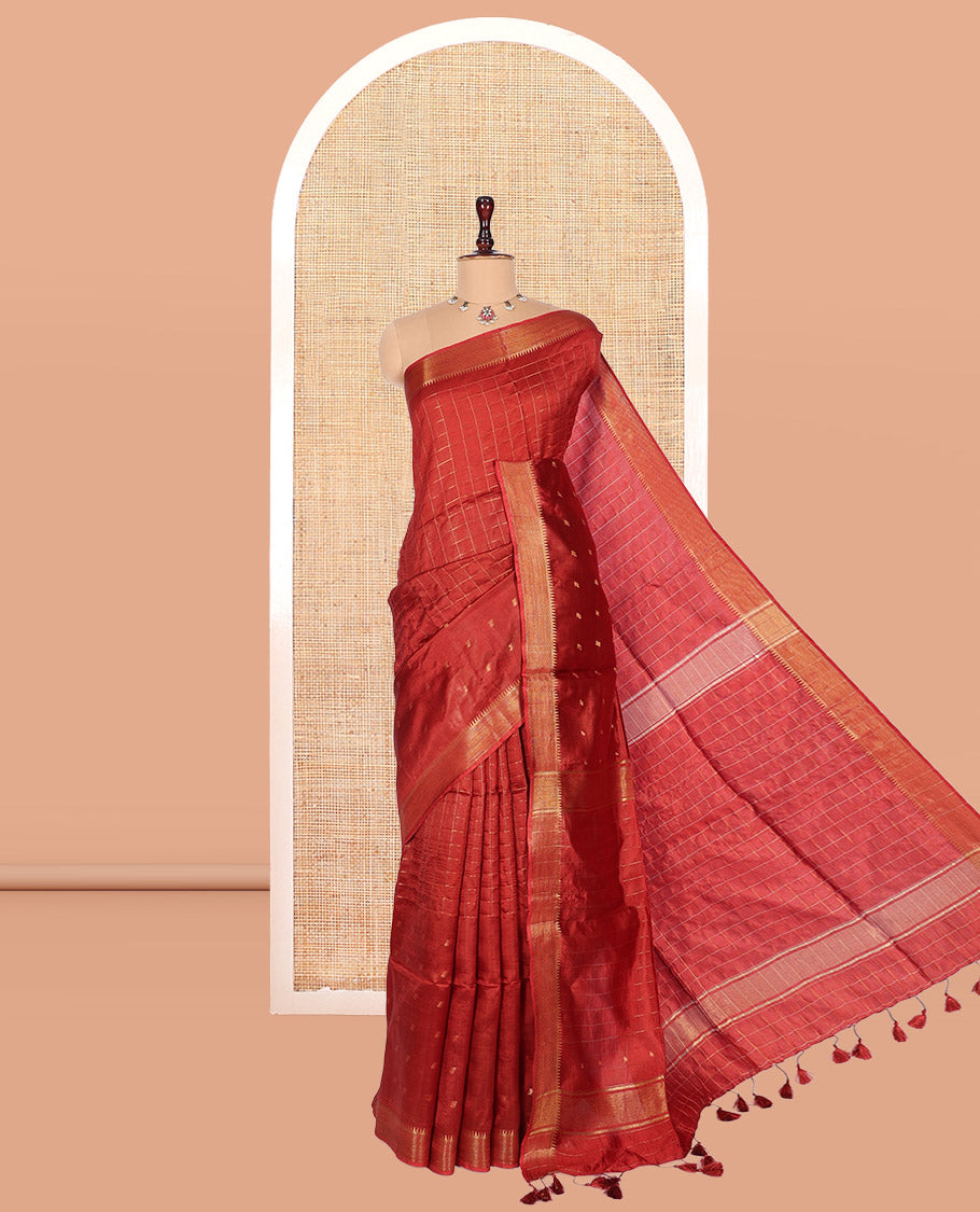 Rust Banana Pith Saree, Gleamed Up with Checks and Buttas, a Zari Temple Border, Striped Pallu, and Matching Blouse